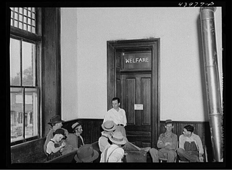 "Waiting their turn at the welfare office in the courthouse," Heard County, Georgia.